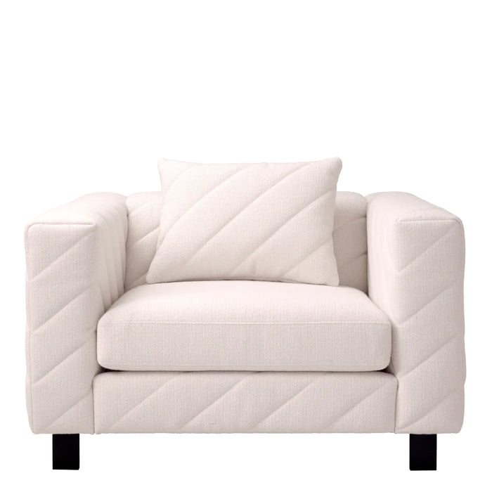 Sillón Eichholtz Avellino en tejido Rêve crema