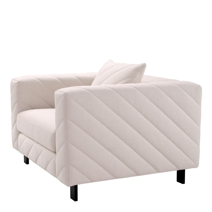 Sillón Eichholtz Avellino en tejido Rêve crema