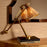 Natural rattan | vintage brass finish | black granite base
