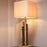 Vintage brass finish | travertine base