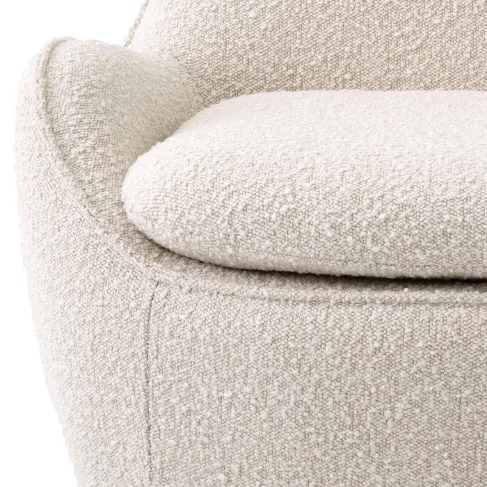 Sillón giratorio Eichholtz Cupido, tela Bouclé crema