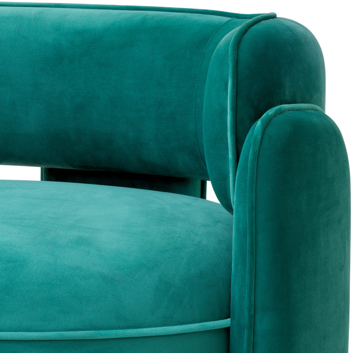 Sillón Eichholtz Chaplin en tejido de terciopelo turquesa Savona