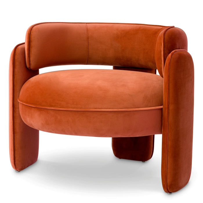 Sillón Eichholtz Chaplin en tejido de terciopelo naranja Savona