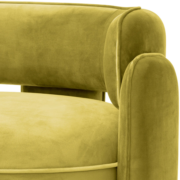 Sillón Eichholtz Chaplin en tela de terciopelo verde vintage Savona